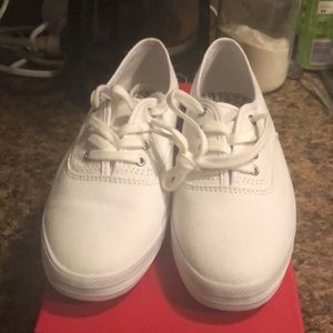 Kelly and Kate white canvas sneakers. Brand new. Size 7M. Machine washable.